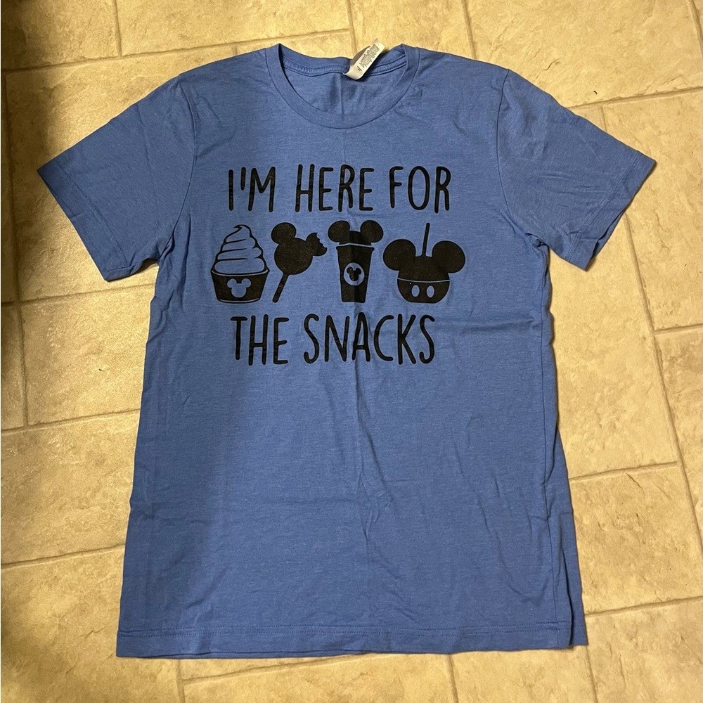 Disney snacks light blue size medium t-shirt.